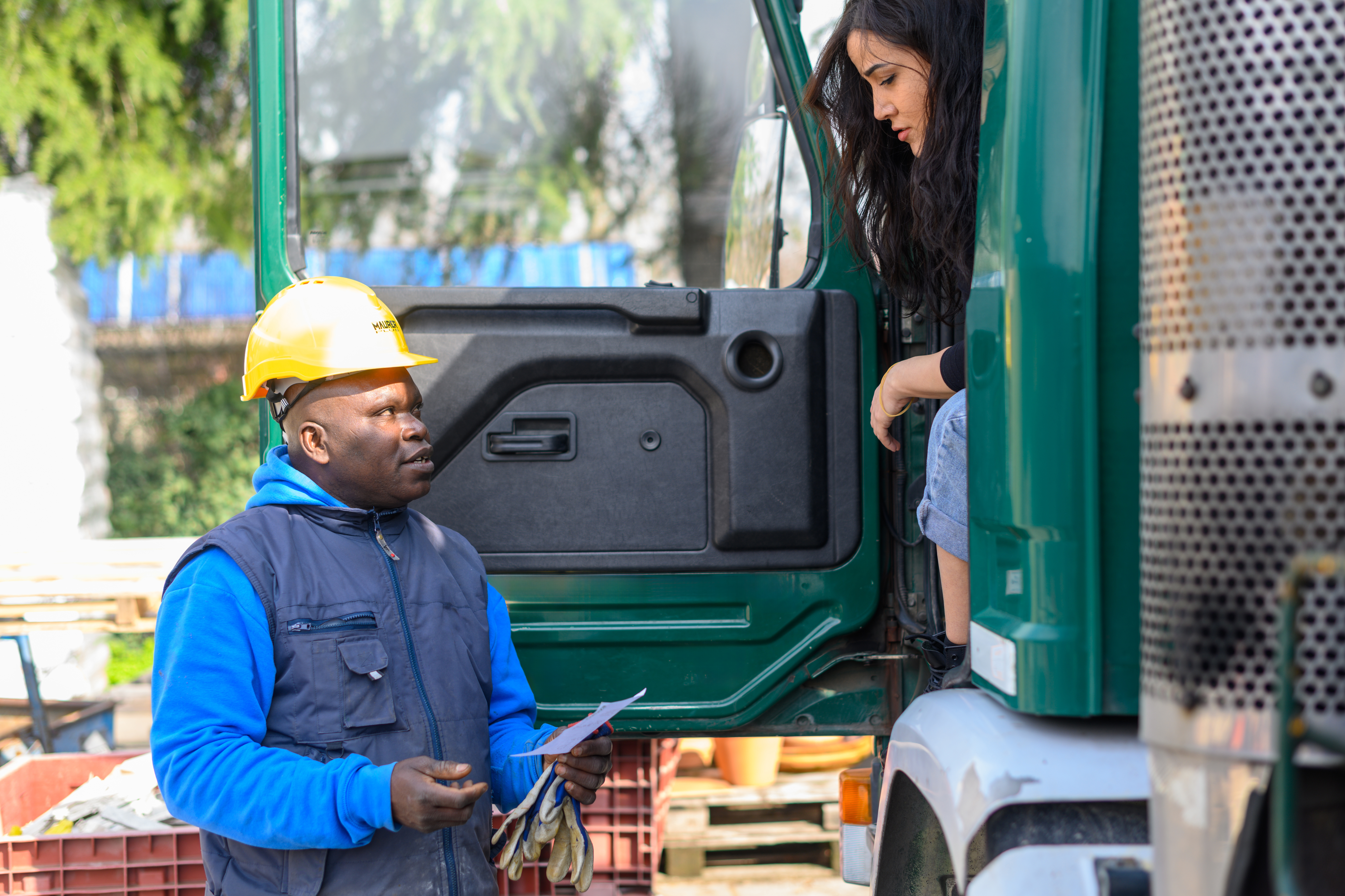 Truck driver reviewing compliance dashboard